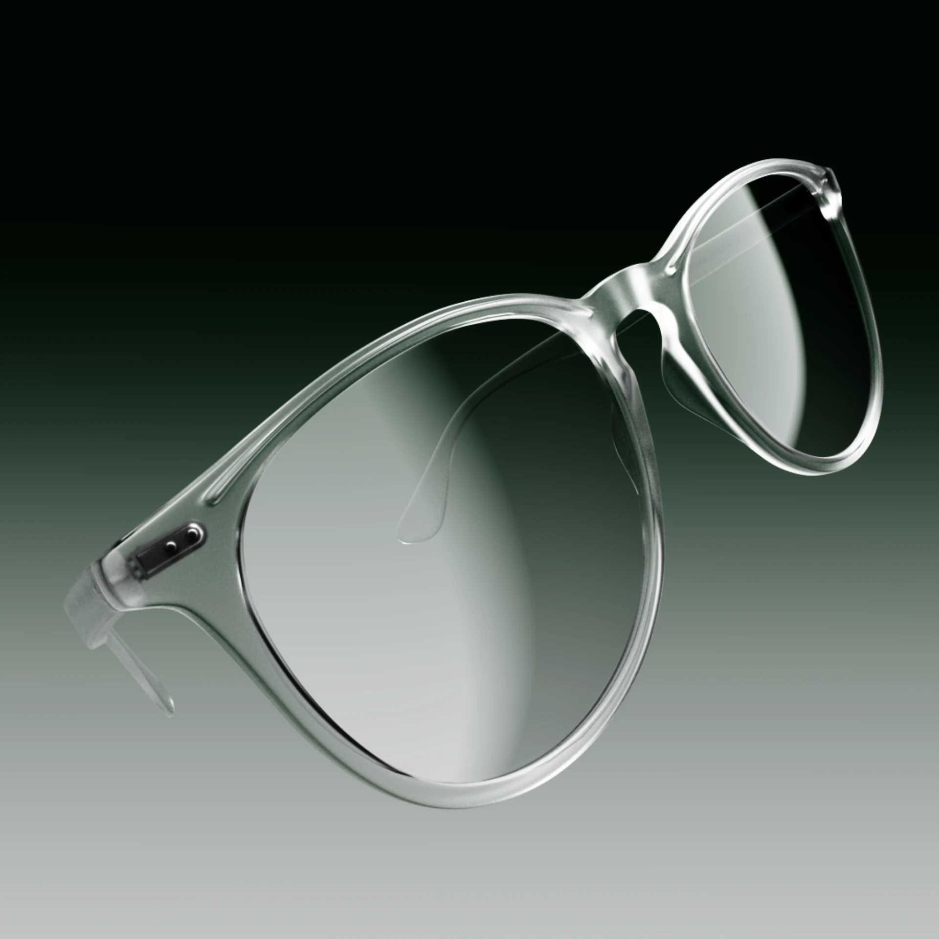 Transparent eyeglass frames against a green background